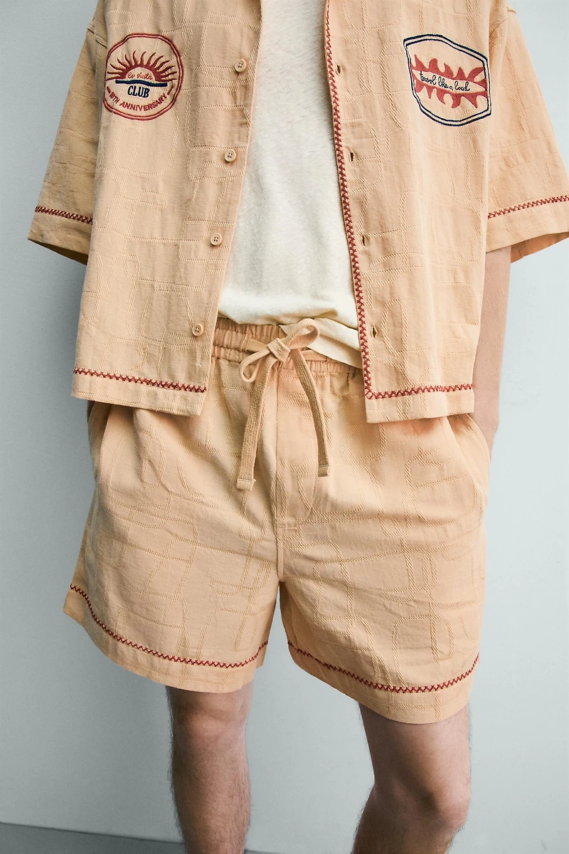 SHORT RELAXED FIT JACQUARD BRODÉ