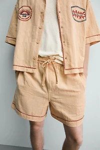 SHORT RELAXED FIT JACQUARD BRODÉ