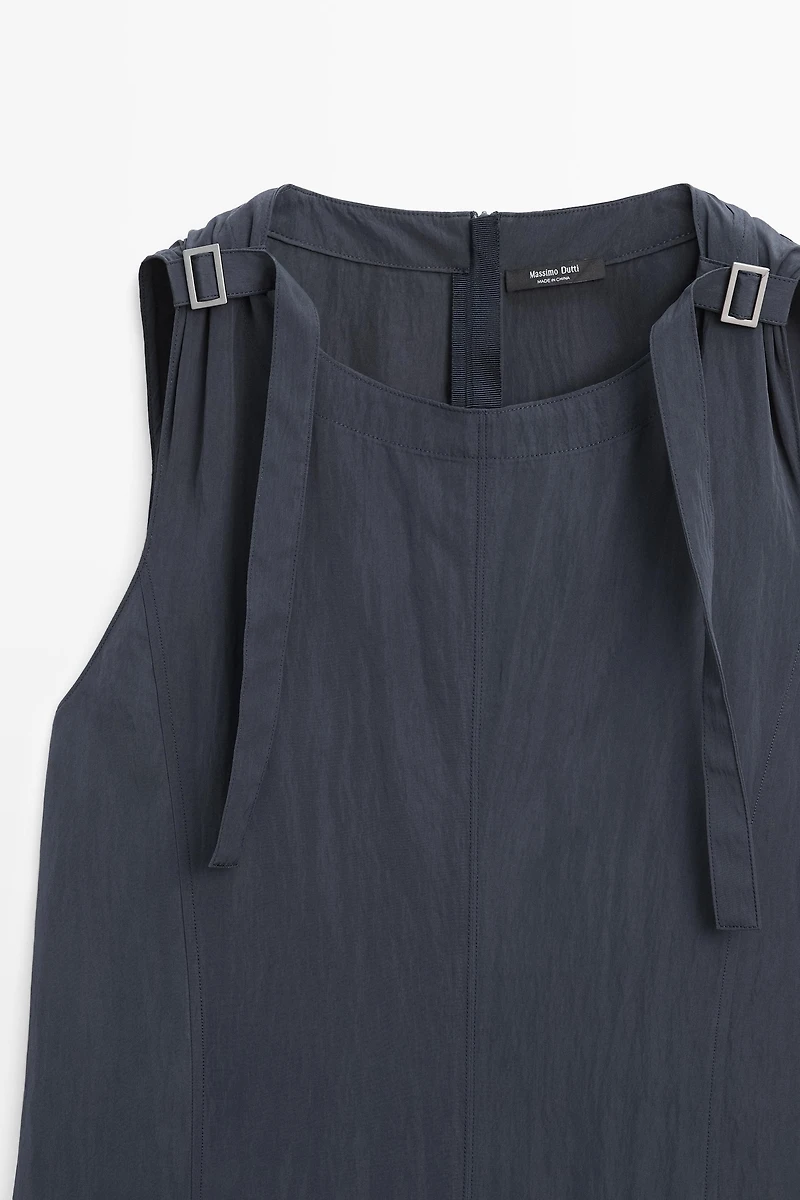 Flowing midi dress with buckles