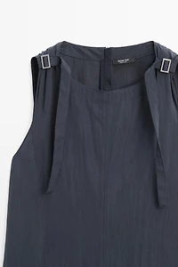 Flowing midi dress with buckles