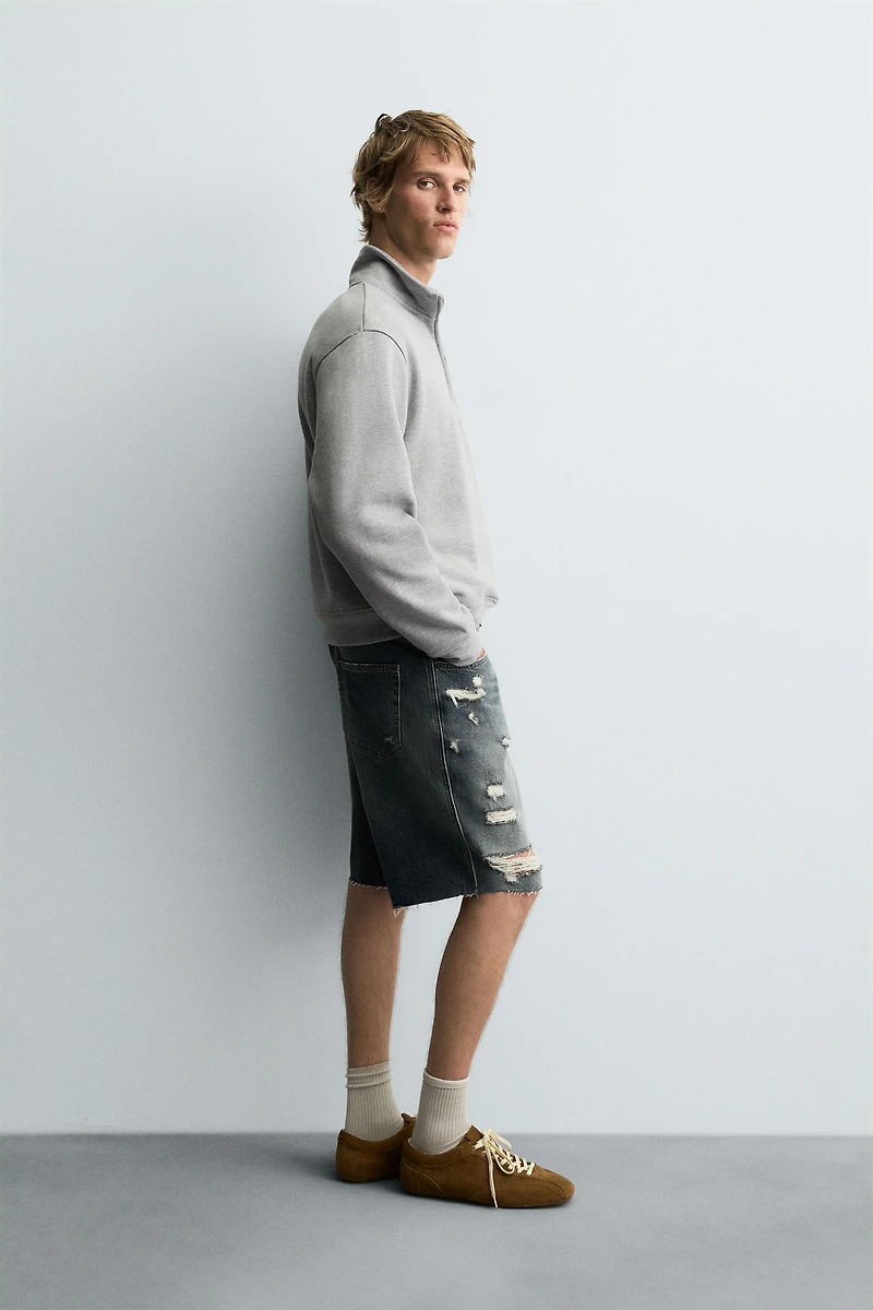 BERMUDA EN DENIM DÉCHIRÉ