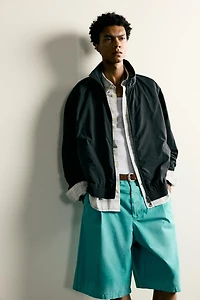 WASHED PLEATED RELAXED FIT SHORTS
