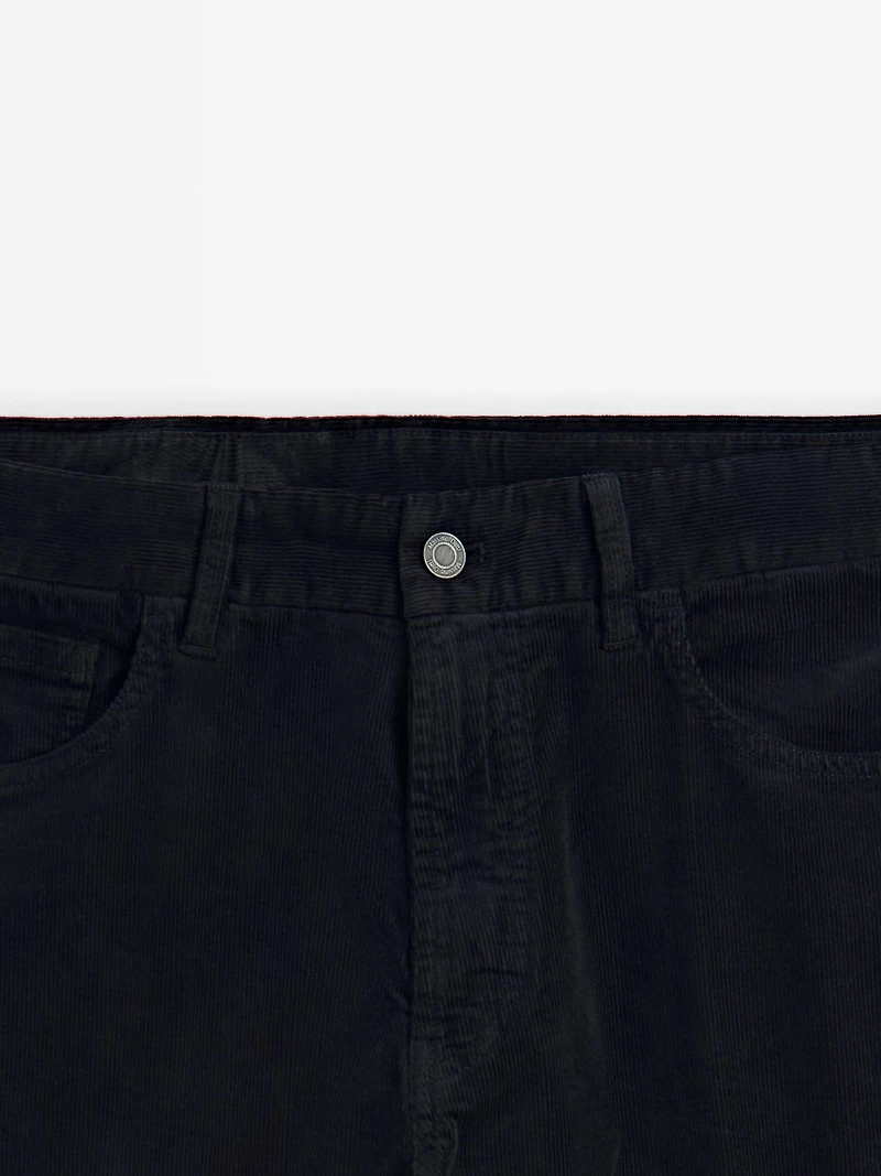 Faux jean en velours côtelé coupe slim