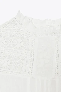 EMBROIDERED LADDER STITCH TOP