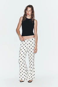 PANTALON SATINÉ À CORDONS ET POIS