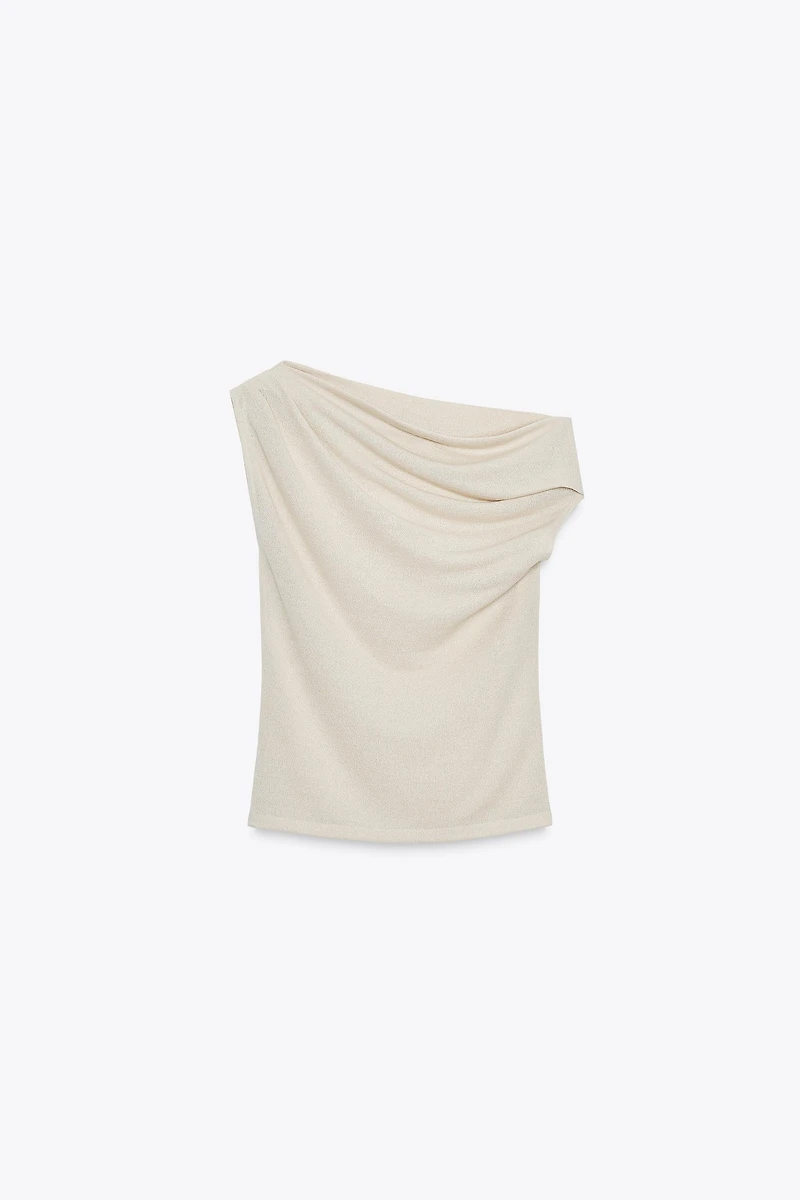 TOP ASYMÉTRIQUE EN MAILLE COUPÉE