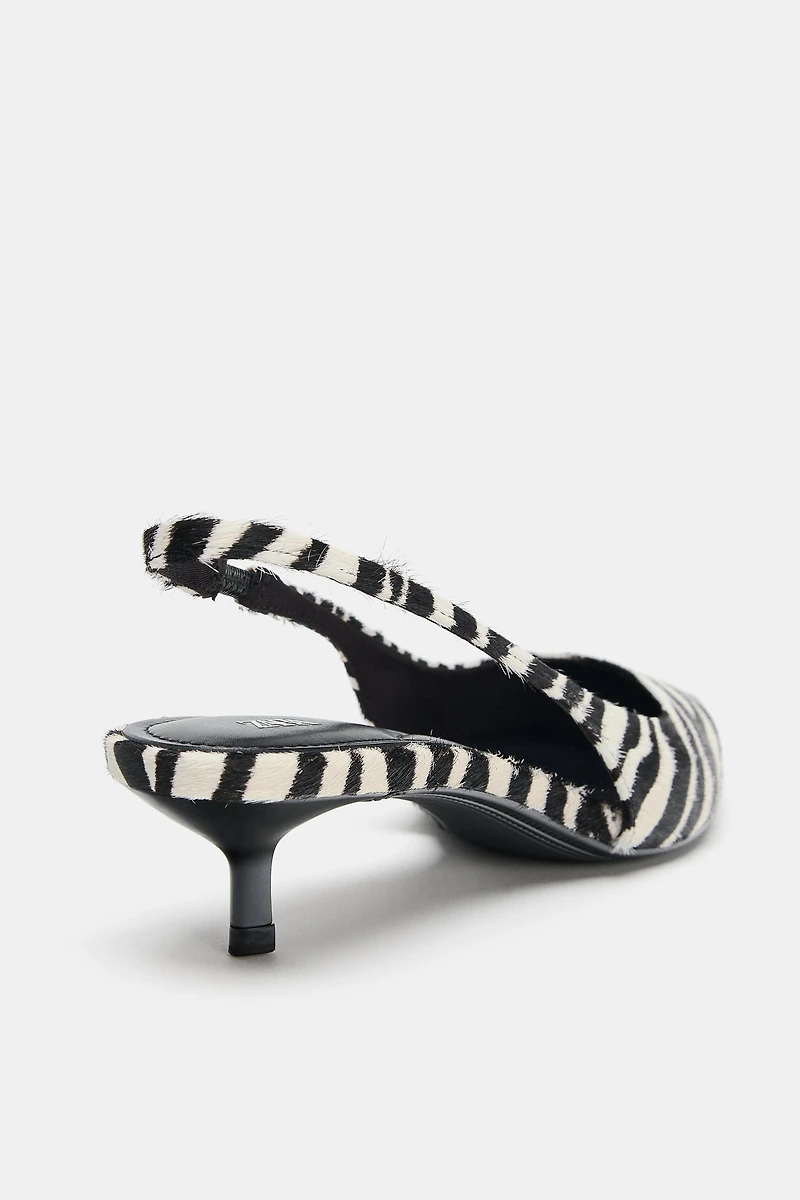 CHAUSSURES EN CUIR À IMPRIMÉ ANIMALIER