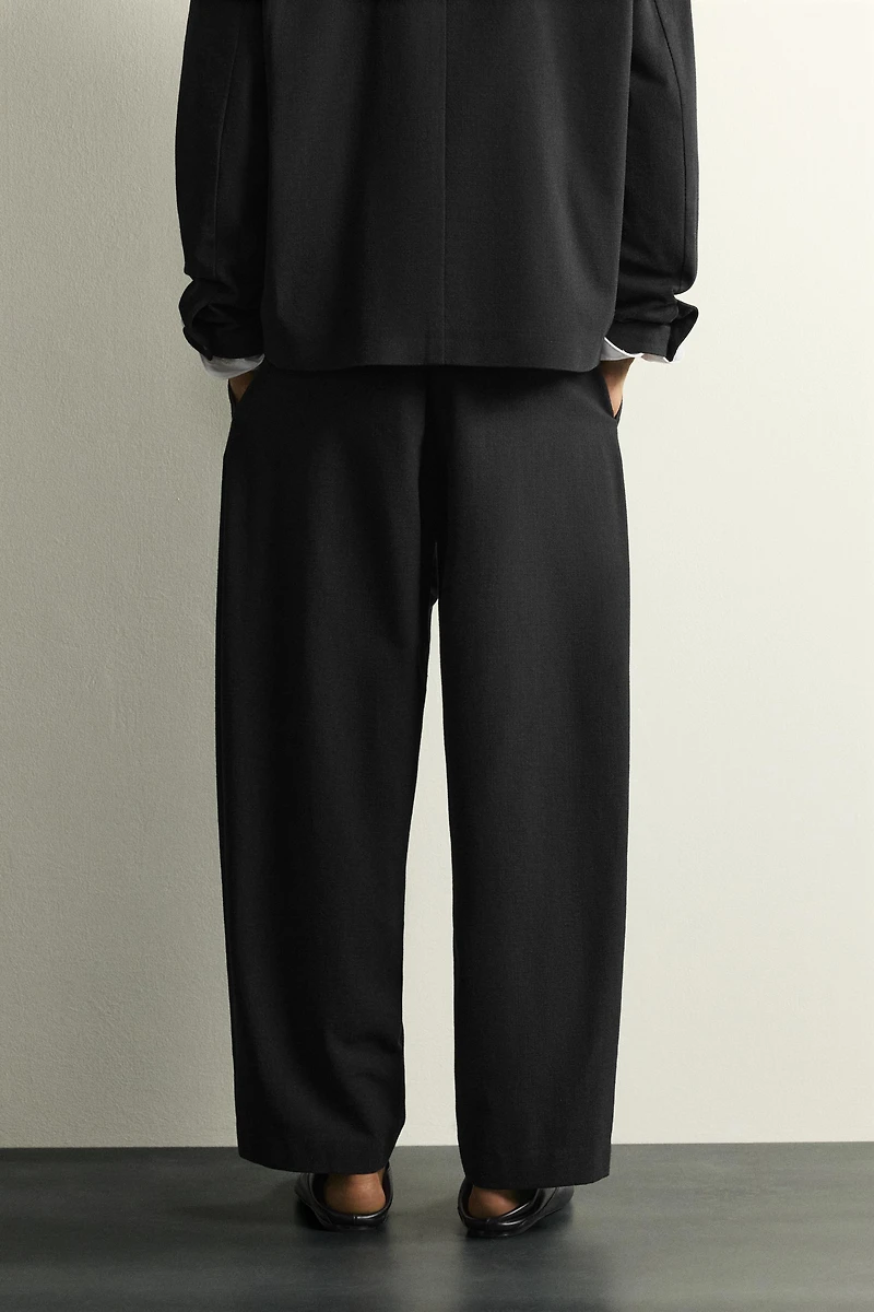 CROSSOVER BALLOON FIT PANTS