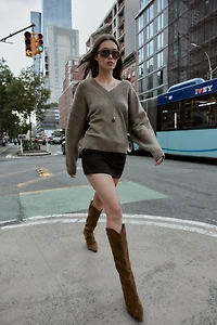 STITCHED SPLIT LEATHER HEELED BOOTS