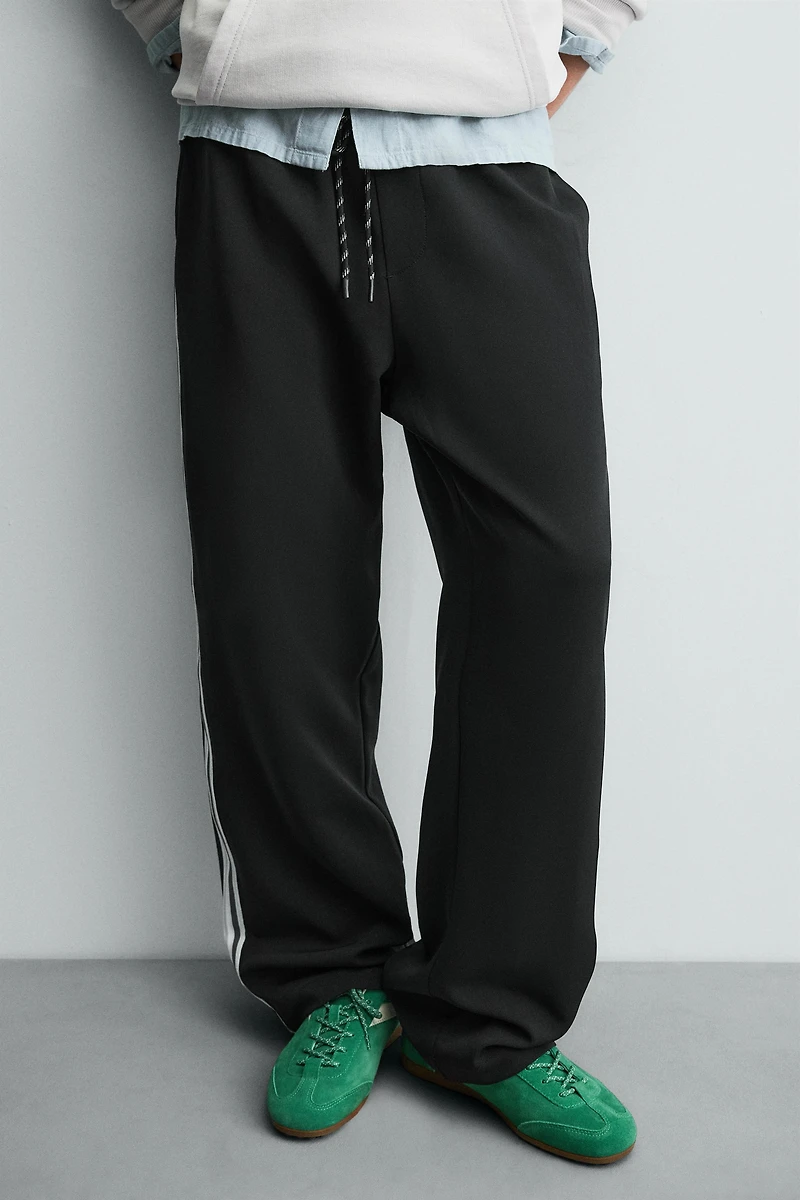 WIDE FIT JOGGER PANTS WITH SIDE STRIPES