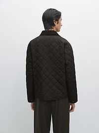 Quilted jacket with corduroy collar