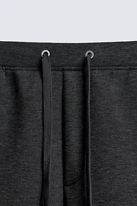 PANTALON EFFET NÉOPRÈNE COUPE LARGE