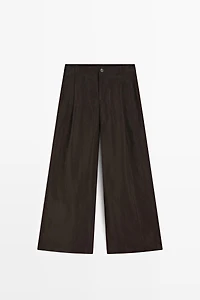 Wide-leg flowing trousers with darts