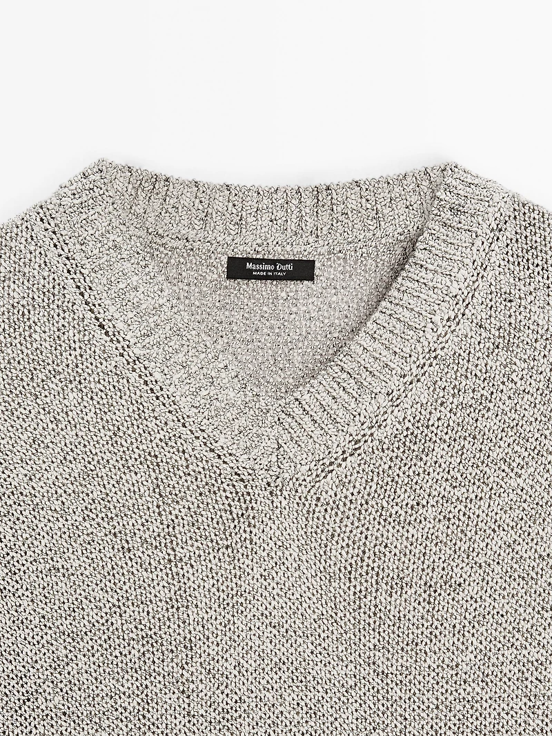 Knit sweater with fabric detail