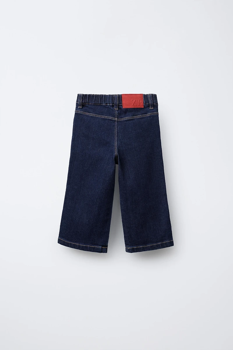 EMBROIDERED POCKET NAVY JEANS