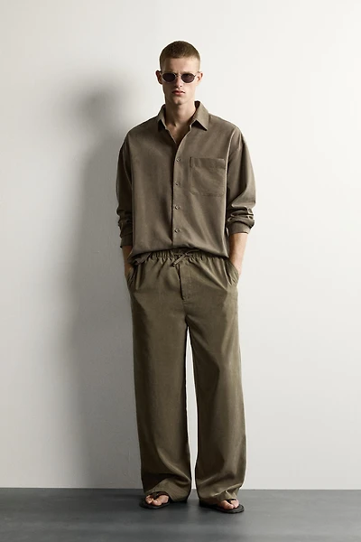 RELAXED FIT FLOWY PANTS