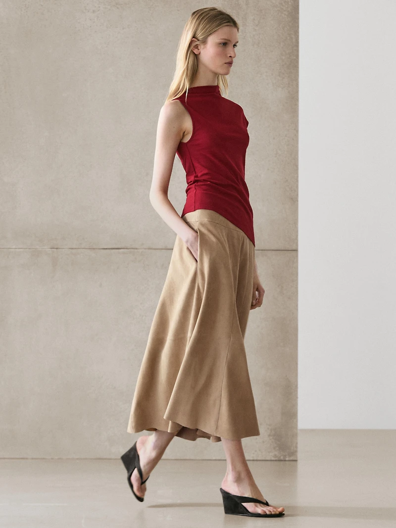 100% cotton top with asymmetric detail