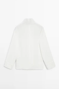 High neck blouse with hem detail