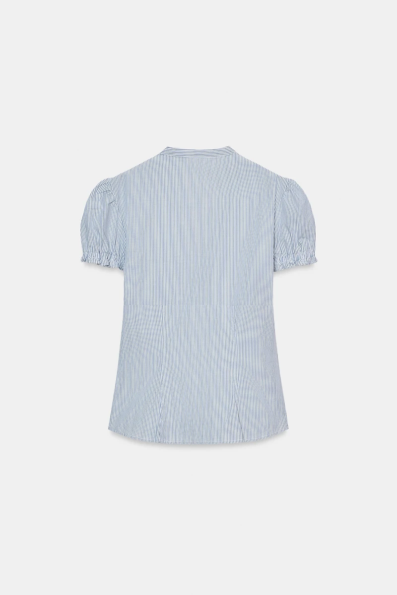 CHEMISE EN POPELINE AVEC OUVERTURE ET NŒUDS