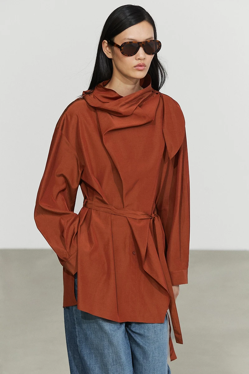 Flowing blouse with tie detail