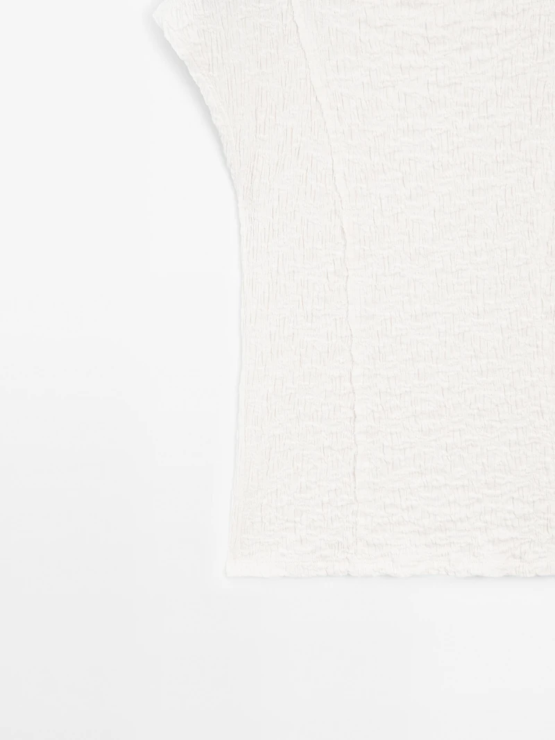 Sleeveless top with gathered detail