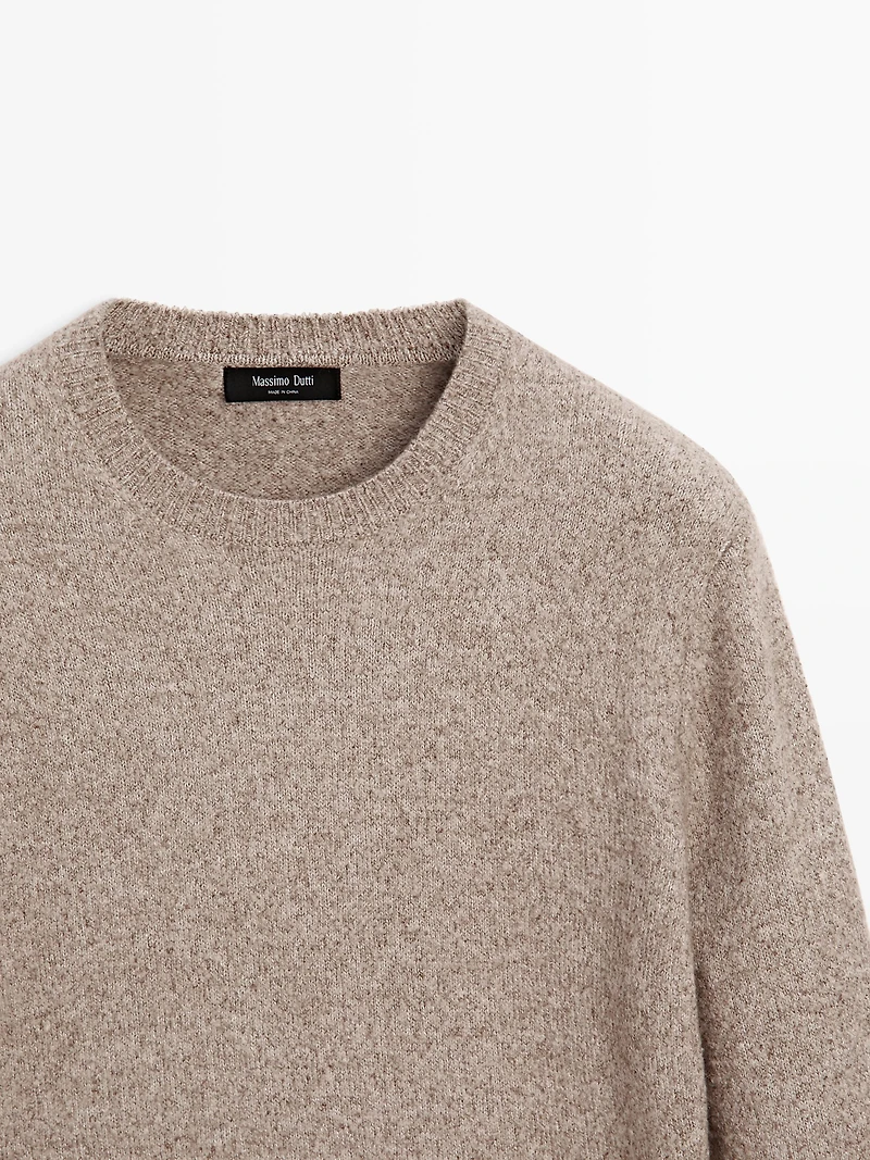 Flecked crew neck knit sweater