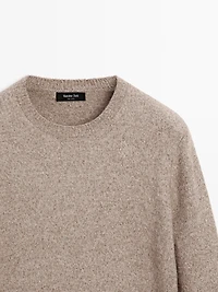 Flecked crew neck knit sweater