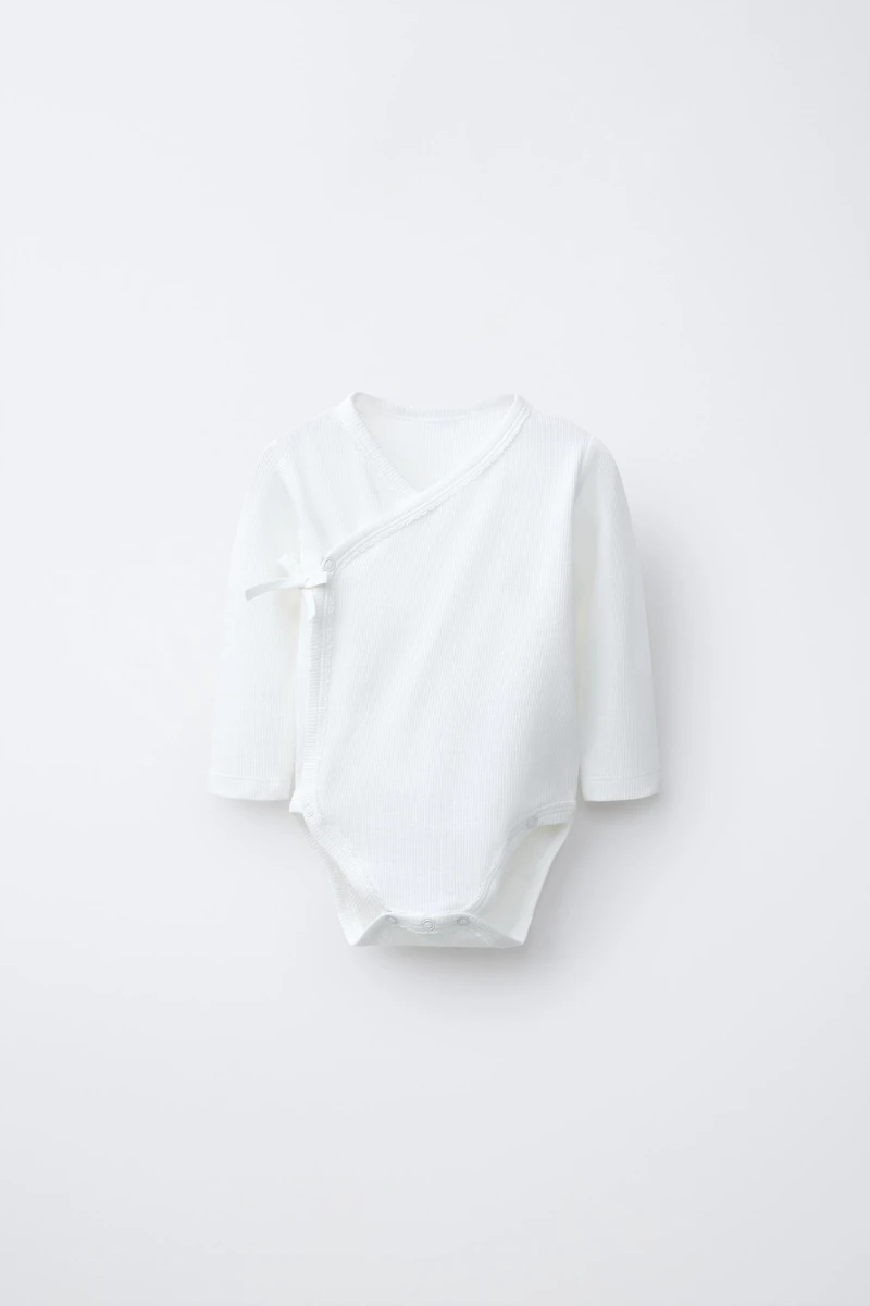 THREE-PACK OF RIBBED KIMONO NECK BODYSUITS