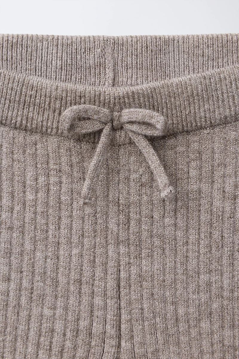 LEGGING EN MAILLE ÉVASÉ