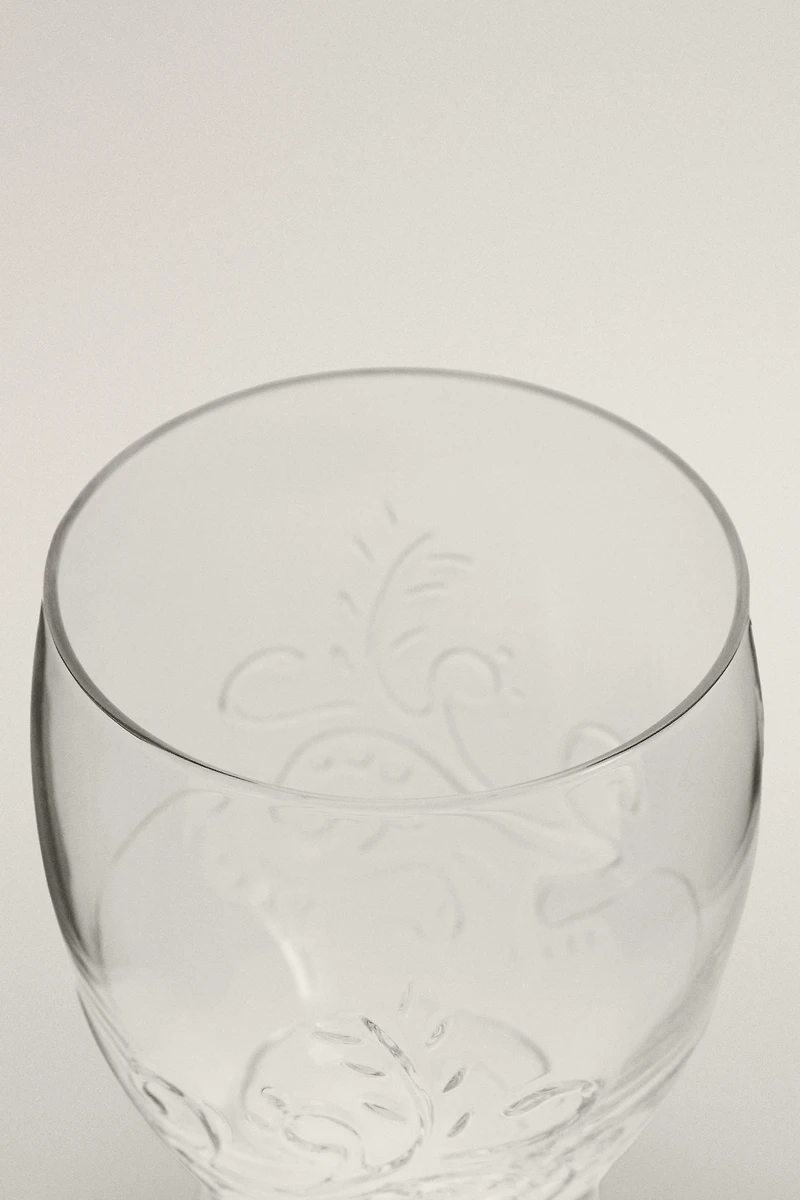 RAISED FLORAL DESIGN GLASS TUMBLER