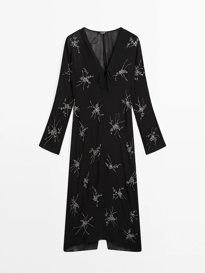 Flowing midi dress with embroidery