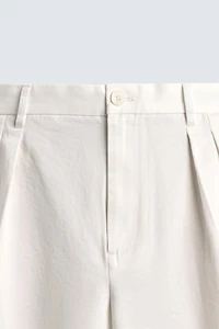 RELAXED FIT PLEATED SHORTS