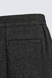 PLEATED WOOL PANTS