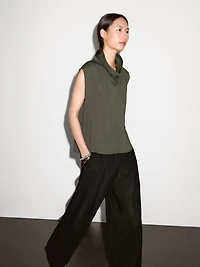 Flowing blouse with draped neck detail