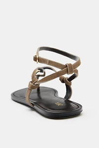 LEATHER SANDALS WITH METALLIC DETAIL