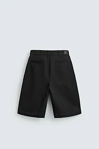 RELAXED FIT PLEATED SHORTS