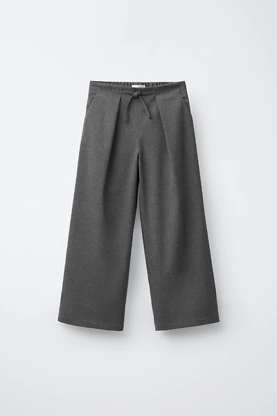 PLEATED SUIT PANTS