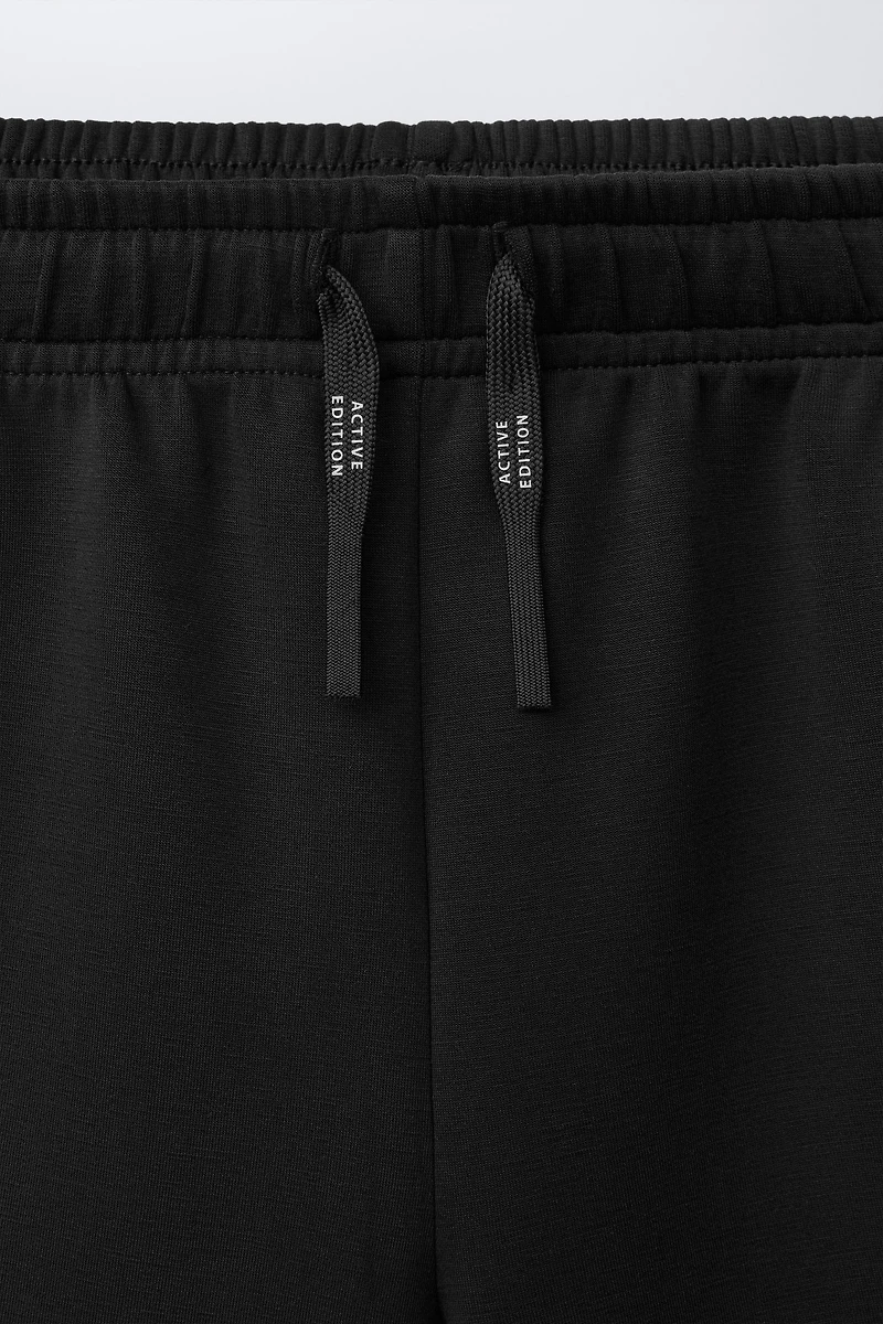 ATHLETIC SHORTS WITH CONTRAST PIPING