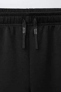 ATHLETIC SHORTS WITH CONTRAST PIPING
