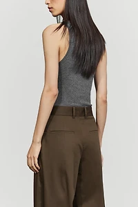 Pants with button-tab hem detail
