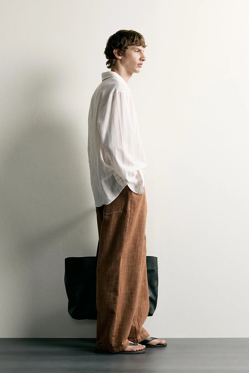 STRIPED COTTON-LINEN POLO SHIRT
