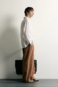 STRIPED COTTON-LINEN POLO SHIRT