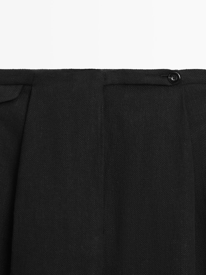 Flowing linen blend trousers with pocket details