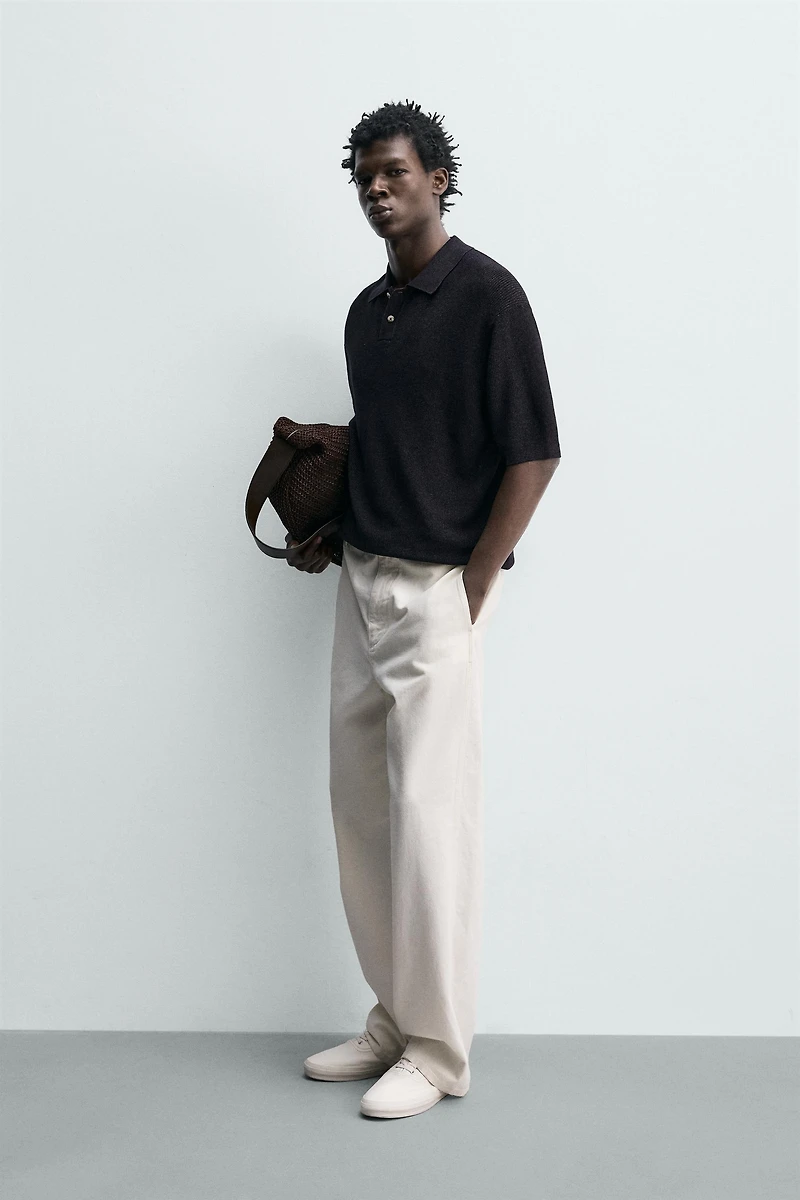 STRUCTURED FLOWY KNIT POLO