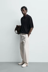 STRUCTURED FLOWY KNIT POLO