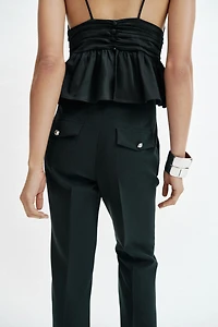 PANTALON FLARE À BOUTONS