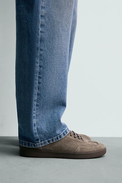 BASKETS EN CUIR