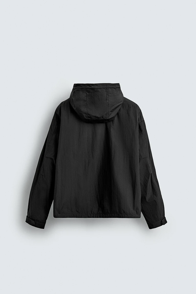 BLOUSON TECHNIQUE À CAPUCHE