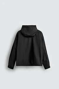 BLOUSON TECHNIQUE À CAPUCHE