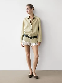 Crochet shorts with floral details